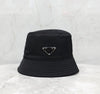 PRADA ブラック トライアングルロゴ バケットハット 2HC137 149096927 [P]