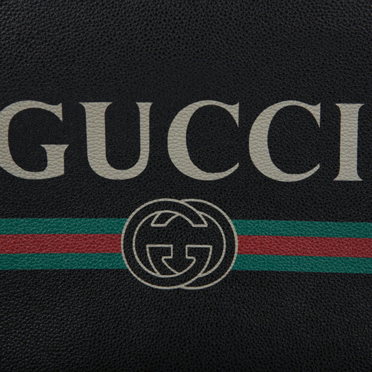 GUCCI 572770 ブラックレザー ストラップ クラッチ 18635375
