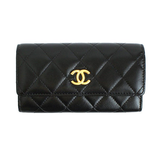 CHANEL Schwarze gesteppte CC Flap Geldbörse 31er Serie 29103479