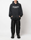 VETEMENTS Oversized Logo Hoodie Waschschwarz UE54HD220B 64344036 [P]