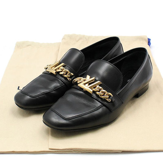 Louis Vuitton Black Upper Case Gold LV Flat Loafer 37 118043758