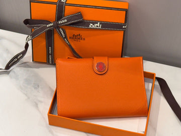 HERMES RWS パスポートケース オレンジ 119265602