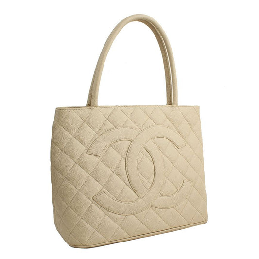 CHANEL Cream Beige Caviar Antique Gold CC Coin Tote 125209365