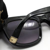 DSQUARED2 Schwarze hornförmige Sonnenbrille mit goldenen Details 132363962 [P]