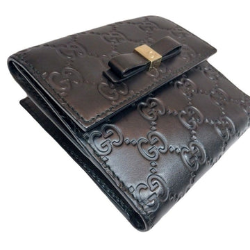 GUCCI Schwarzes Sima-Leder mit goldenem Schleifen-Emblem und Signature Geldbörse 406925 149300218