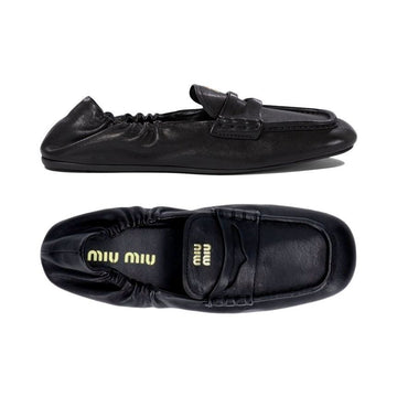 MIU MIU Lederloafers mit Logo in Gold 26SS Schwarz 5D341E EFX F0002 153589217