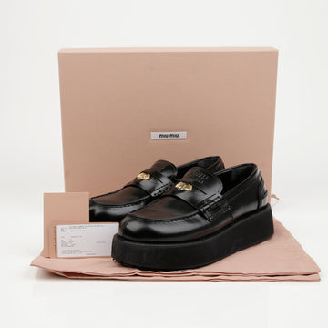 Miu Miu Logo Engraved Loafers 156509676