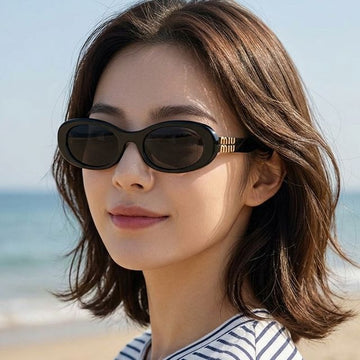 MIU MIU Sonnenbrille Oval Schwarz 157191015