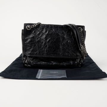 SAINT LAURENT Schwarze mittlere gekrümmte gesteppte Nicky-Kettentasche 156714378