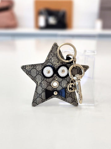 Gucci Supreme Star Bag Charm Keyholder 157523768