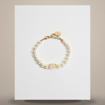 DIOR Armband mit goldfarbener Metalloberfläche & weißem Harzperlen B1096MTGRS_D301 158482758 [P]