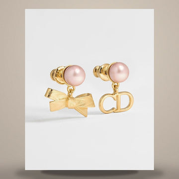 DIOR CD Bows Ohrringe in goldfarbigem Metall und irisierenden pinken Harzperlen E4835WOMRS_D88P 158665603 [P]