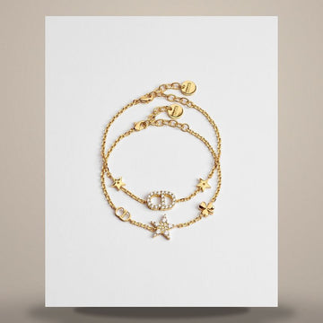 DIOR Armband-Set mit goldfarbener Metalloberfläche und funkelnden Kristallen 158727224 [P]