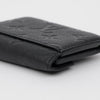 LOUIS VUITTON Monogram Prägung Leder Geldbörse Schwarz 158796167 [P]