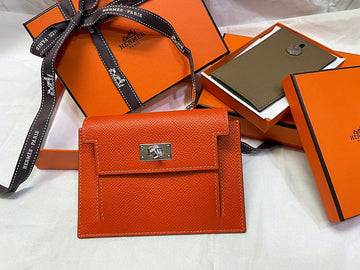 HERMES Kellner Compact Pocket Orange Geldbörse mit Silberdetails 6392336978 29195403