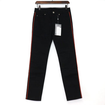 ALEXANDER MCQUEEN Damenjeans mit orangefarbenen Seitenstreifen in Schwarz 376334 152898529