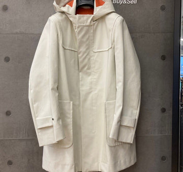 JIL SANDER Wasserdichter Kapuzenmantel in Elfenbein und Orange H032120 148410410