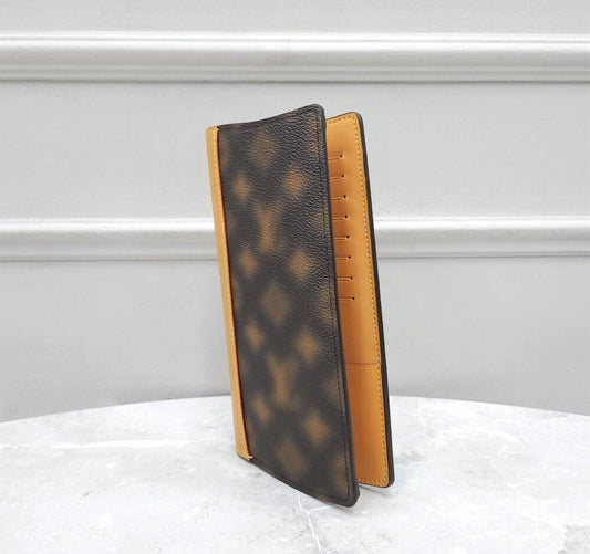 LOUIS VUITTON ディスイザスナット モノグラム ブラッザ長財布 75476317