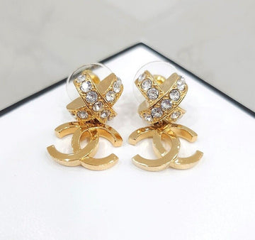 CHANEL New CC Logo Ribbon Cubic Earrings Gold 133672926