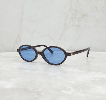 MIU MIU リガード ロゴ サングラス ブルー SMU04ZF 154662314