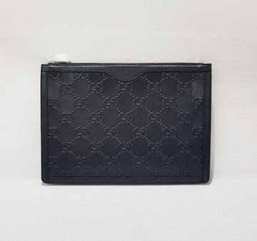 Gucci GG Embossed Leather Clutch 646449 138557200